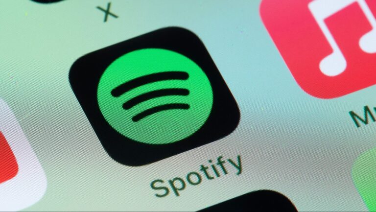 Apple approves spotify app updates that allow users to access