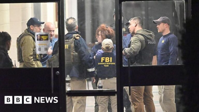 Two victims named as search resumes for gunman Two victims named as search resumes for gunman